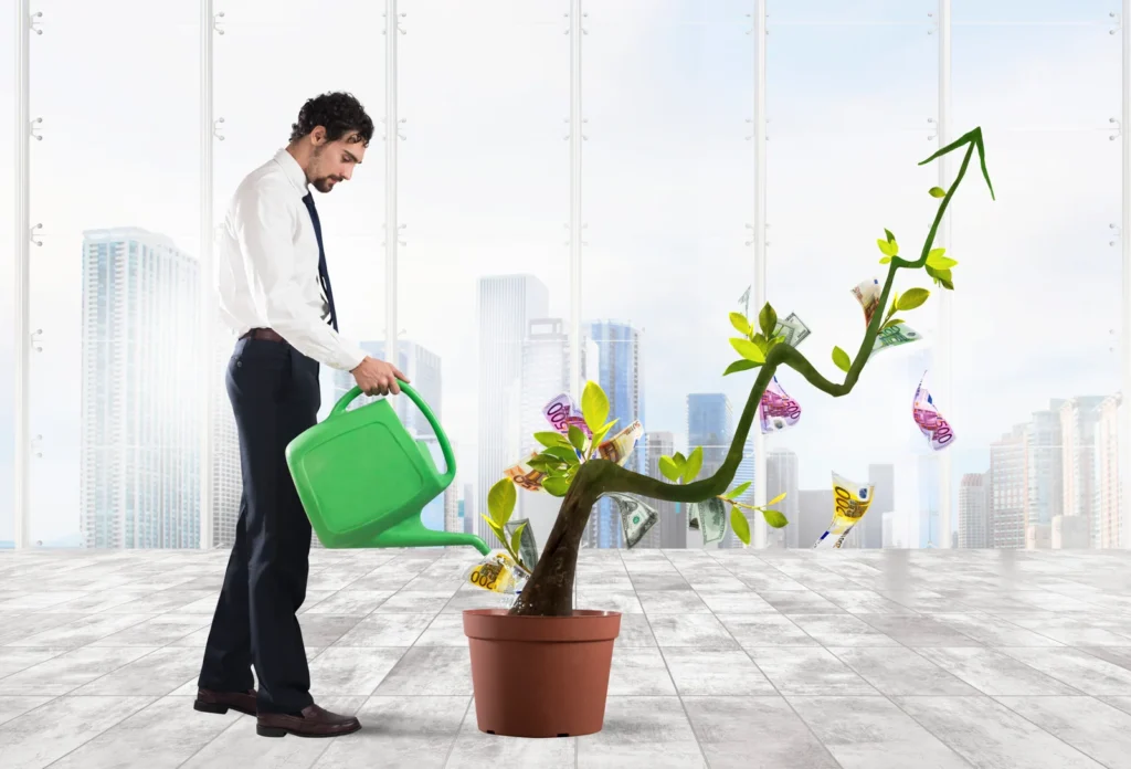businessman watering money coins as if they were plants scaled 1 - Tip Top Arborists